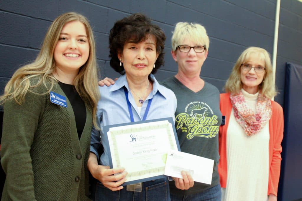 OKCPS support staff posing with a certificate