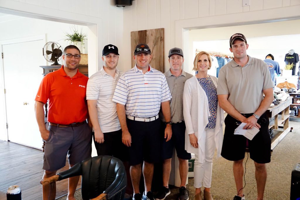 teachers at golf tournament