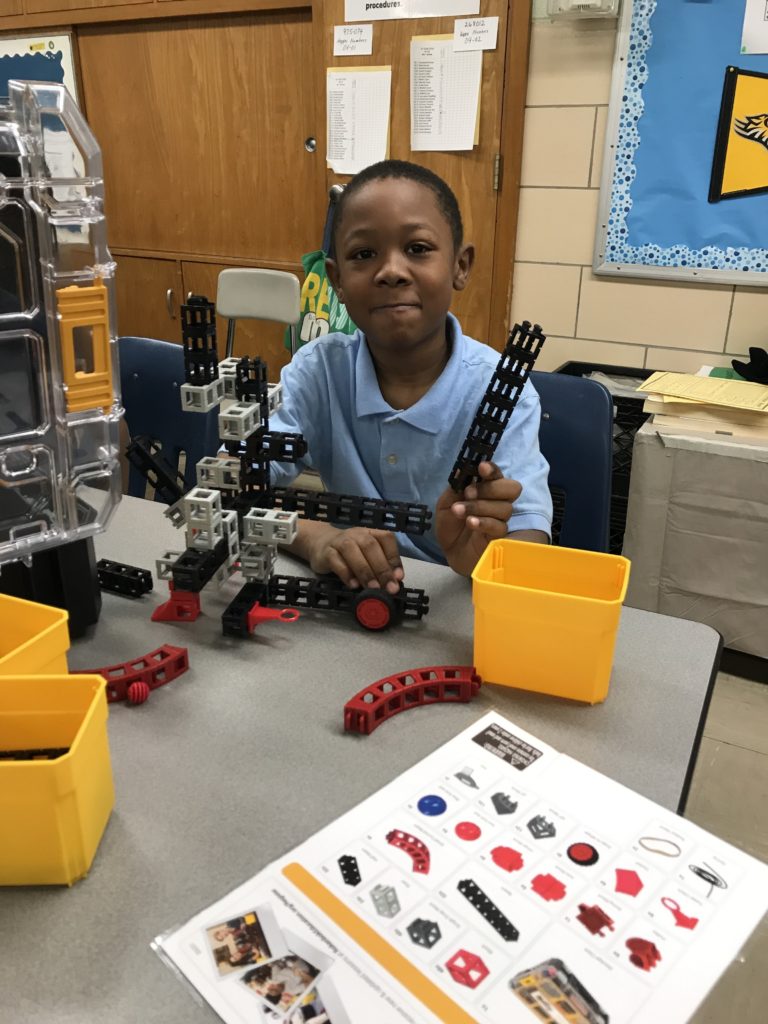 student doing stem activity