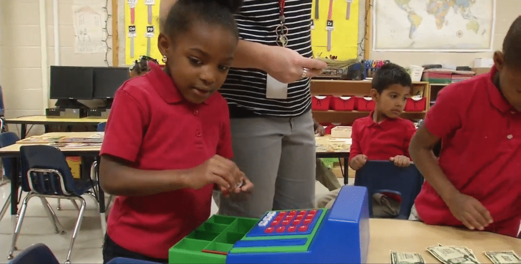 student playing in class